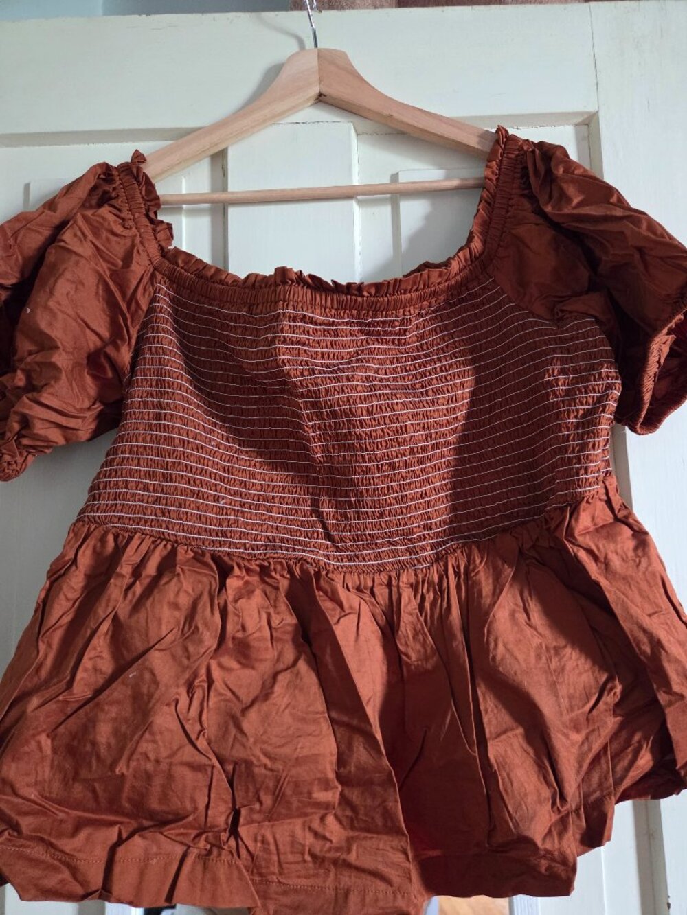 Orange smocked top
